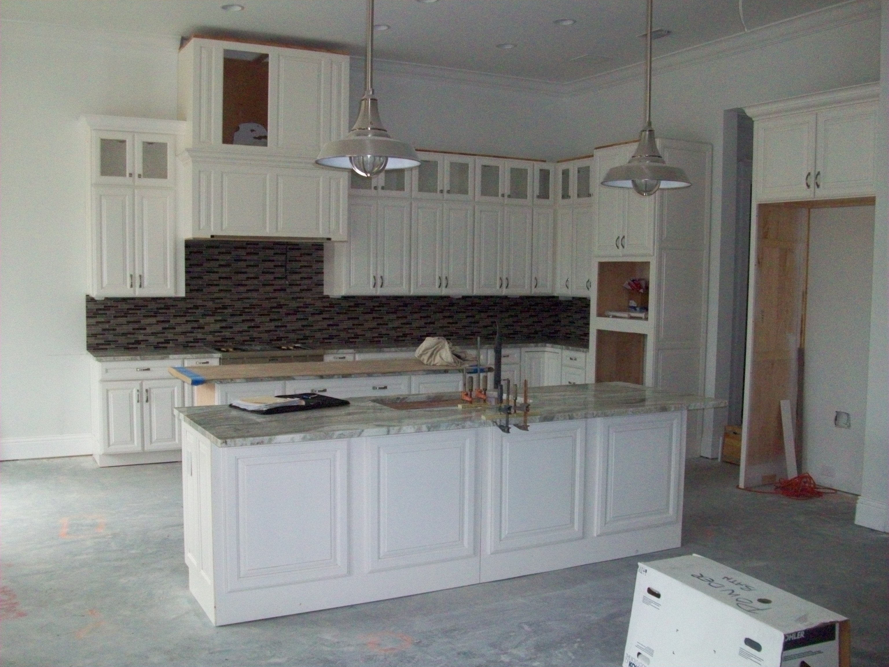Cabinet installation at Southern Living Showcase Home - UPDATE